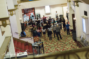 Young people from local youth organizations rehearse in the Fox Theater lobby. 